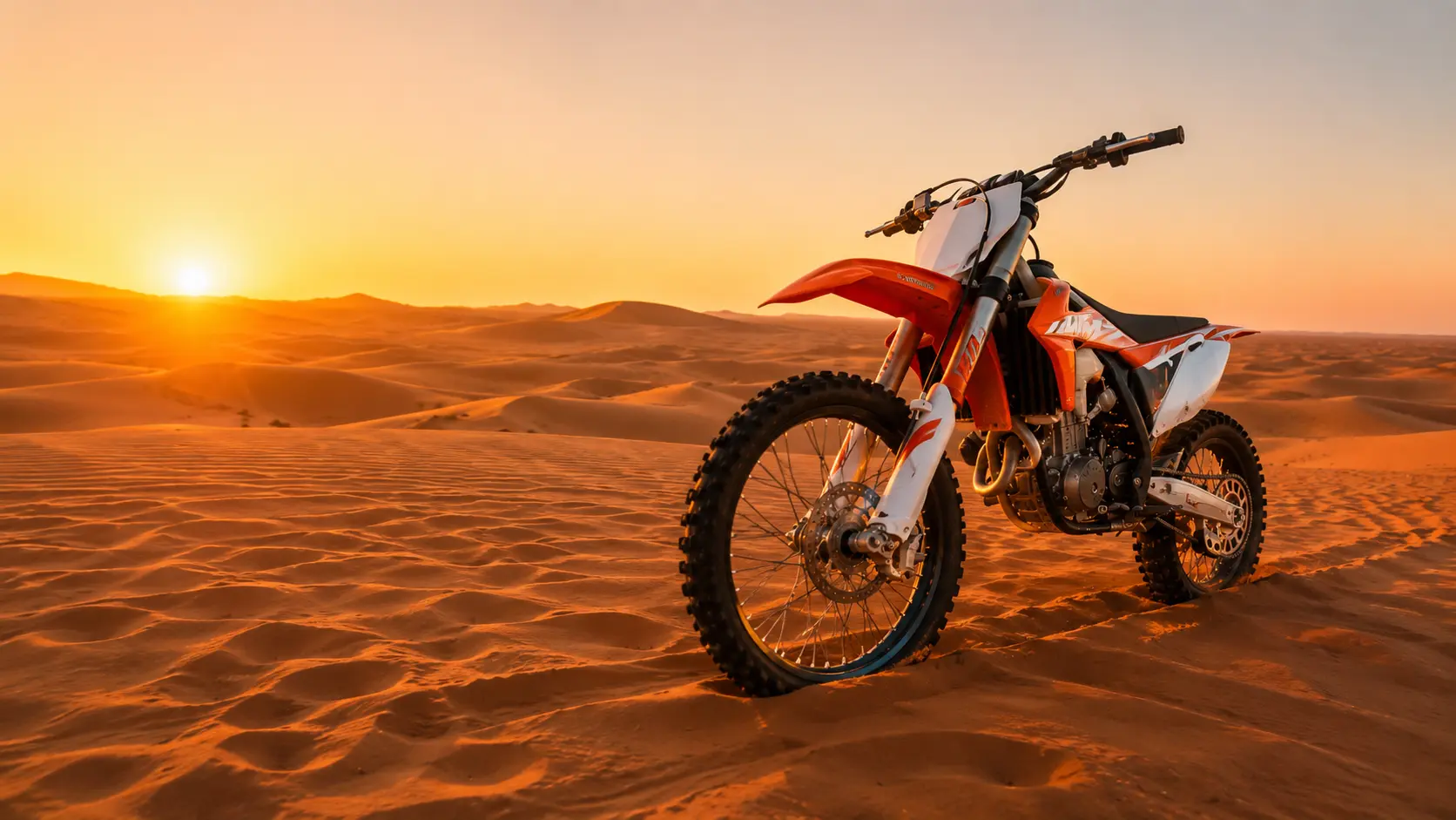 Dirt bike rider on Dubai desert terrain